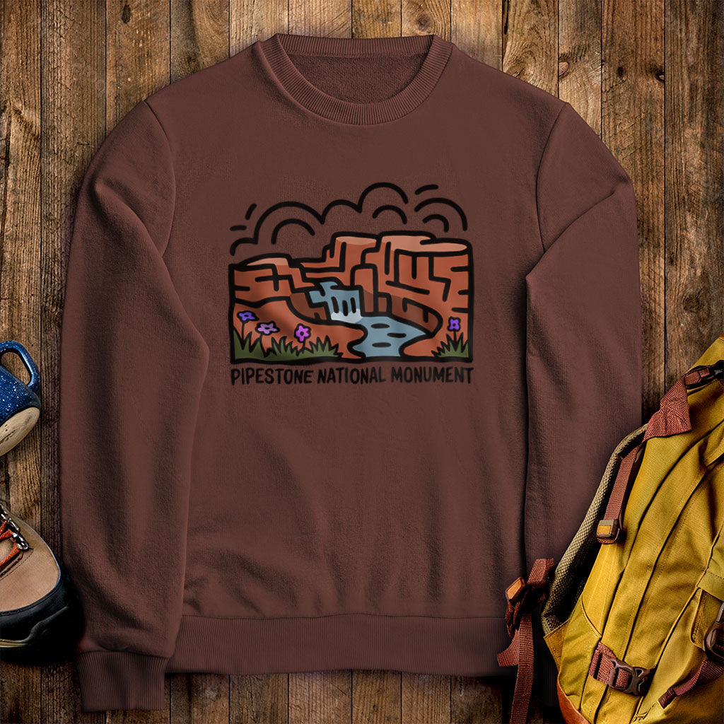 Pipestone National Monument Crewneck Sweatshirt Cocoa Adventure and Outdoors Themed Sweatshirt